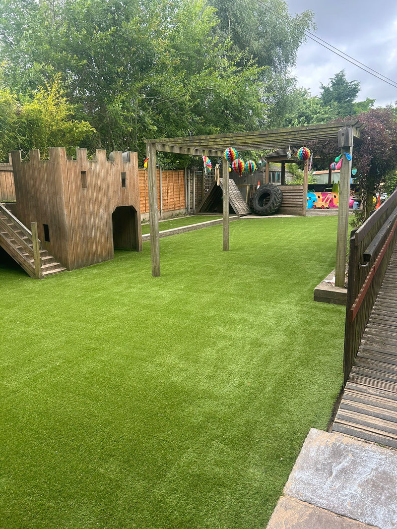 Play equipment on artificial turf